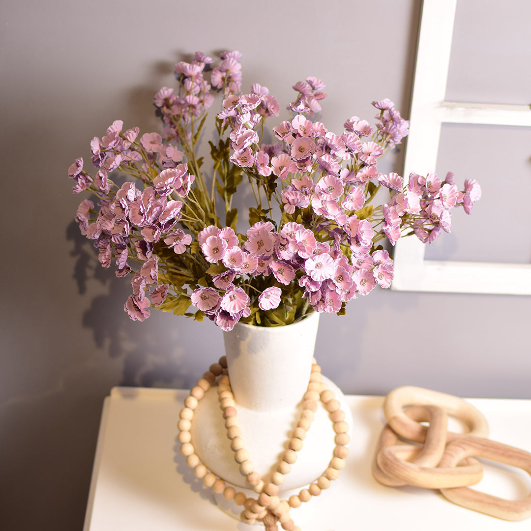Lavender Gypsophila or small Cosmos-like blooms stem