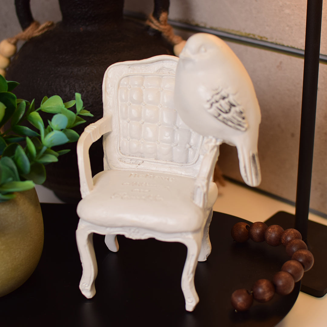Bird on chair Figurine