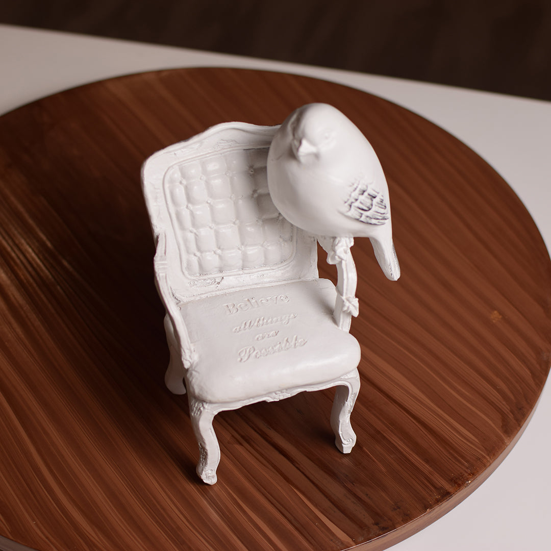 Bird on chair Figurine